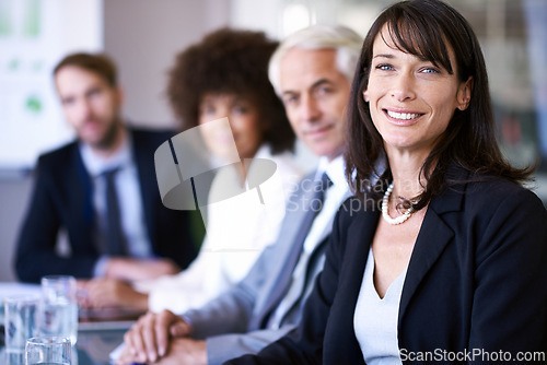 Image of Portrait, woman or executive in business, meeting or planning of company, corporate or collaboration. Businesswoman, colleague or team in conference room as professional, teamwork or conversation