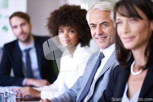 Image of Portrait, man or executive in business, meeting or discussion of company, corporate or collaboration. Businessman, colleague or team in conference room as professional, teamwork or conversation