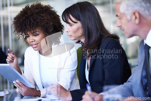 Image of Team, tablet and business people in meeting, planning and brainstorming strategy in office. Collaboration, technology or diverse professional group, CEO and consultants in conversation for discussion