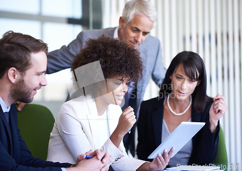 Image of Group, tablet and business people research, discussion and brainstorming online strategy in office. Collaboration, technology and diverse team planning project, CEO or consultants in meeting together