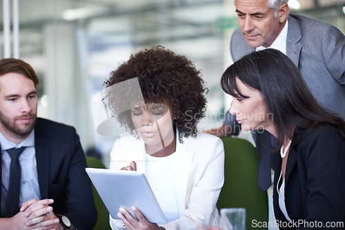 Image of Group, tablet and business people in meeting, planning and brainstorming strategy in office. Collaboration, technology and diverse professional team, CEO and serious consultants in discussion online