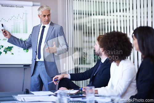 Image of Business people, man and presentation or conference on infographics with white board, financial statistics or sales. Meeting, teamwork or ceo speaker with data analytics, graph report or revenue plan