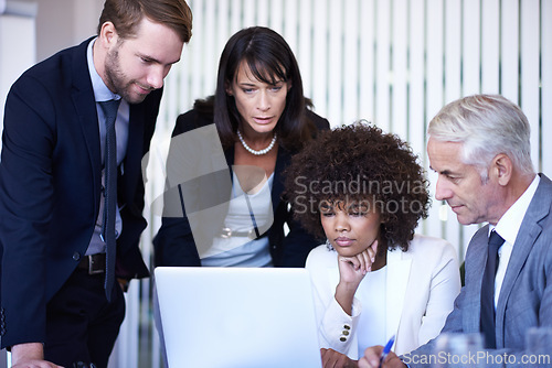 Image of Business, meeting or coaching with diversity, laptop and technology in office. Businessman, woman and mentor with teamwork, planning and support for corporate brainstorming with staff or partnership