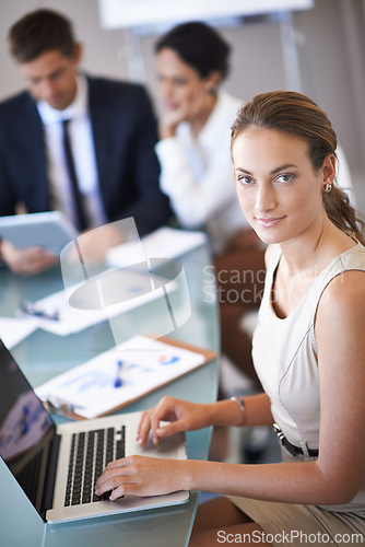 Image of Businesswoman, laptop and chart in office portrait with employees, working with technology and statistic results. Online, data and analysis in boardroom with colleagues, web search and internet