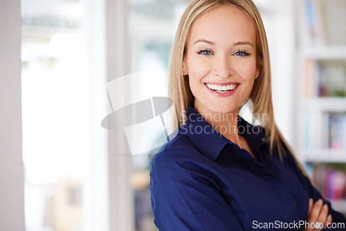 Image of Businesswoman, portrait and happy with arms crossed in home office, self employed and lawyer or attorney for legal advice. Female person, confident and professional counsel for corporate career.