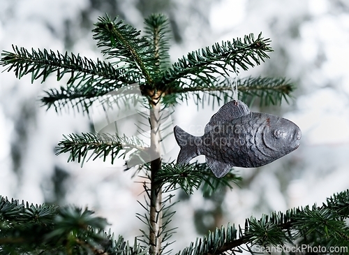 Image of carton christmas tree toy fish on a christmas tree