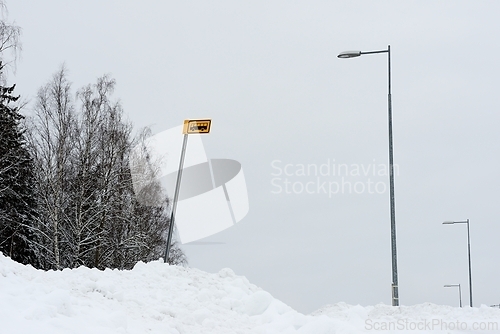 Image of bus stop outside the city in winter somewhere in Finland