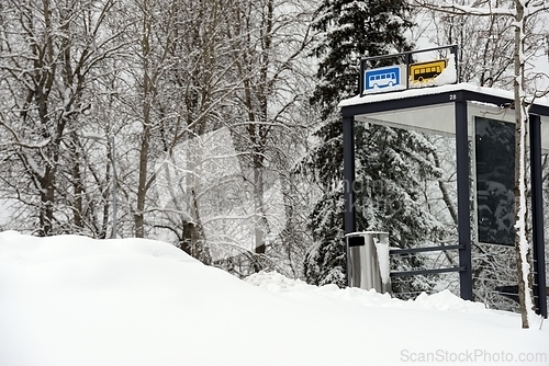 Image of bus stop outside the city in winter