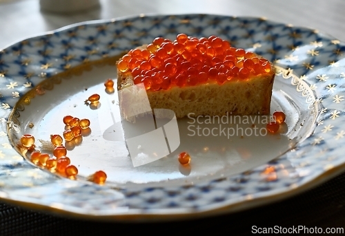 Image of bread with red caviar 