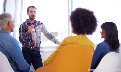 Image of Team, business people and meeting with leader for presentation, discussion and planning project in creative startup. Group, speaker and diverse designers brainstorming strategy or training together