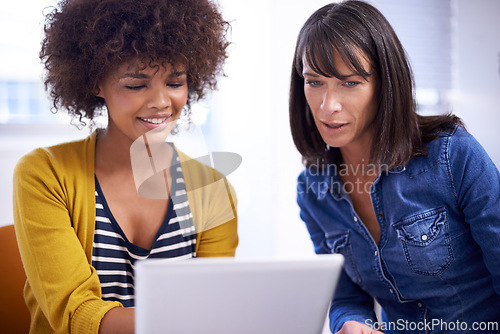 Image of Women, casual and startup with tablet to search internet for online website or browsing social media, diversity and innovation. Female colleagues, tech and together for digital planning or designs.