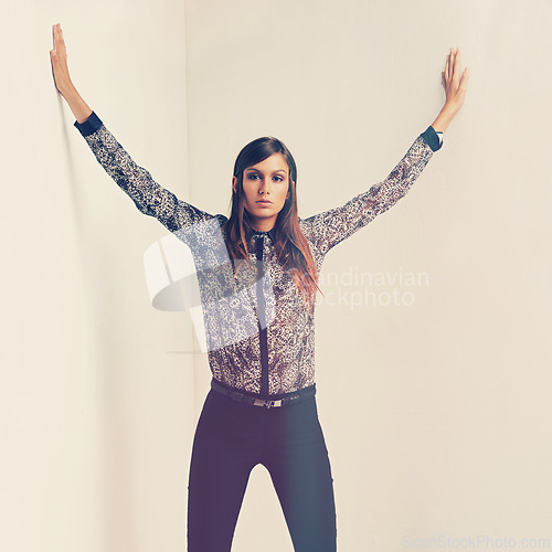 Image of Clothes, model and portrait of woman for fashion, style and trendy with vintage outfit isolated in studio background. Female person, retro and lady with print shirt, black trousers and garments