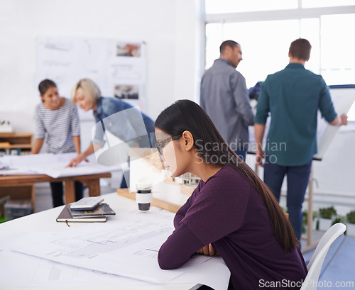 Image of Architecture, building and blueprint with designer woman in office for construction, planning or project management. Business, design and documents with young architect in workplace for development