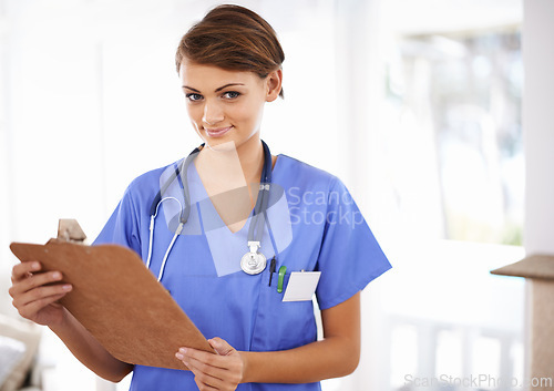 Image of Happy woman, portrait and nurse with clipboard for prescription or medical checklist at hospital. Female person, practitioner or scrub with smile, documents or paperwork for life insurance at clinic