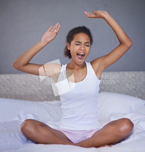 Image of Woman, bed and stretch with yawn for morning awake on Sunday for relax weekend in apartment, day off or bedding. Female person, arms and resting in home or vacation nap or comfortable, break or tired