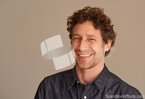 Image of Mature man, portrait and laugh in studio, comedy and funny memory to remember on brown background. Happy male person, positive and comic for silly or goofy joke, smile and humor on mockup space