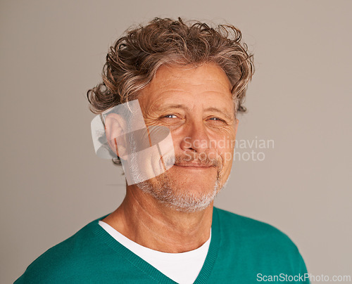 Image of Mature man, portrait and happy in studio, peace and confidence for wrinkles on brown background. Male person, positive face and proud of wellness or health, smile and satisfaction on mockup space