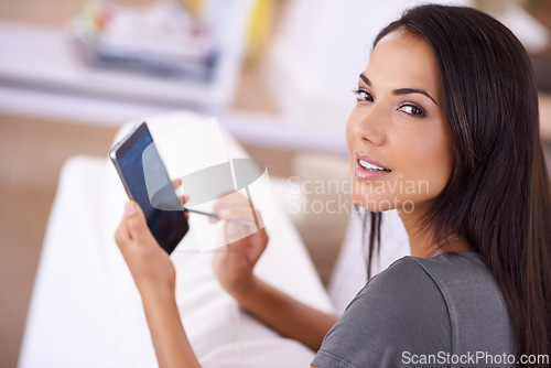 Image of Woman, home and sofa on smartphone with stylus for online research, information or social media networking. Portrait, female person and living room with touchscreen for internet and entertainment