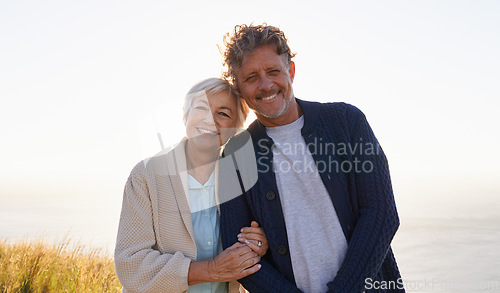 Image of Smile, hill and portrait of senior couple in nature for sunset walk, travel or retirement vacation. Coast, field and people with happiness for bonding, summer holiday or tourism in California
