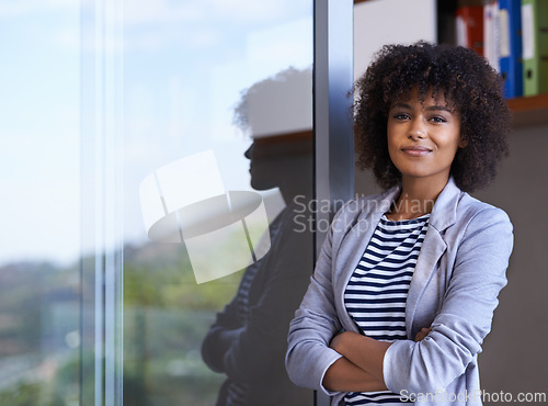 Image of Office, portrait and confident businesswoman with smile, pride and professional at window. Balcony, business and happy woman with arms crossed for fresh air, startup and entrepreneur at workplace