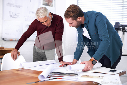 Image of Coworker, man and blueprint with drawing at office with pencil for a building design or renovation, teamwork and project as architects. Business, people and collaboration on task, plan and layout