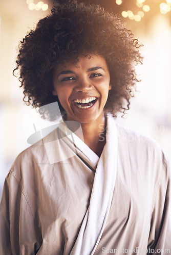 Image of Spa, woman and portrait with laugh in a bathrobe for wellness, cosmetics and beauty treatment. Health, skincare and resort with an African female person ready for dermatology at a hotel with a smile