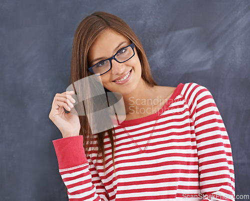 Image of Woman, teacher and smile in portrait by blackboard, education and proud of school curriculum. Happy female person, idea and professional in classroom, knowledge and planning for lesson in university