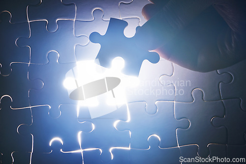 Image of Abstract, puzzle and fit piece in problem solving with solution to challenge in strategy or planning. Jigsaw, game or search for match with shape of idea to light the dark with innovation in business