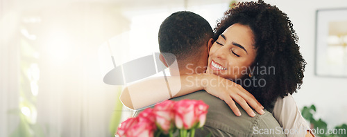 Image of Couple, hug and flowers gift for valentines day with love for surprise bouquet for relationship, anniversary or date. Man, woman and embrace in home with roses for marriage, celebration or present