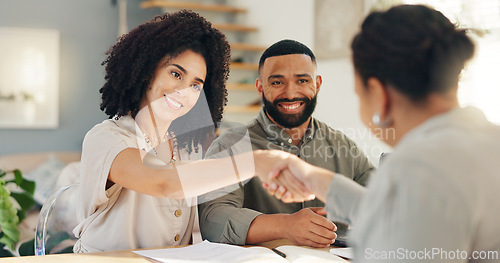 Image of Handshake, meeting and couple with real estate agent for buying new home, house or property. Happy, deal and young man and woman shaking hands for apartment or building purchase with realtor.