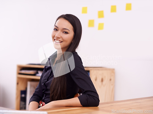 Image of Office, smile and portrait of business Asian woman at desk with confidence, pride and creative startup. Professional, consultant and worker at desk for career, job and working in modern building