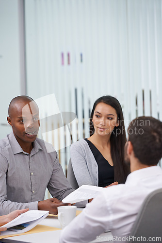 Image of Business people, meeting and conversation with feedback, planning and cooperation for a project launch. PR agency, manager and leader with review and employees with ideas and teamwork with startup