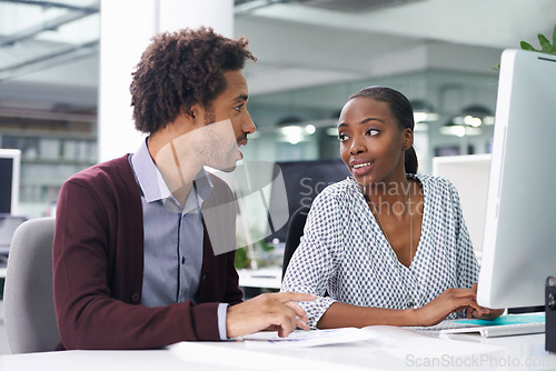 Image of Collaboration, computer and business black people in office together for planning or strategy. Desktop, meeting or teamwork with young woman and woman employee in workplace for agenda or review