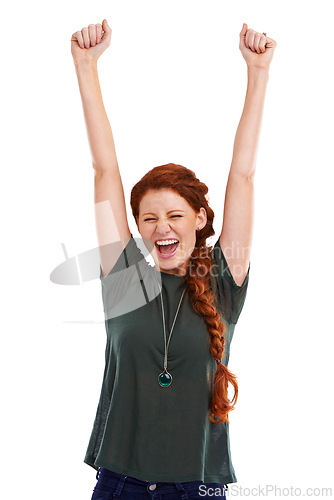 Image of Excited woman, fist pump and celebration in studio for winning, promotion and bonus. Happy, female person and screaming for profit prize, discount and competition on deal or sale on white background