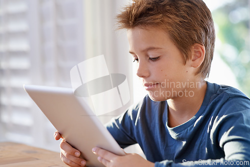 Image of Home, boy and tablet for education with online learning for child development, growth and study. Homework, internet and research with information for assignment or school project and deadline.