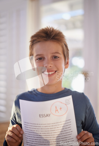 Image of Child, portrait and paper exam for education learning or student essay in home or scholarship, goals or academic. Male person, face and document pride or primary school studying, results or knowledge