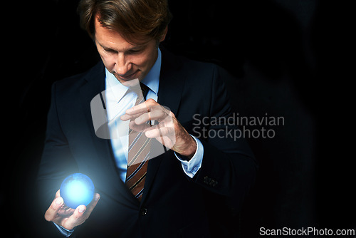 Image of Businessman, globe and hologram for networking, global expansion and worldwide innovation in studio. Futuristic crystal, magic and professional man on black background, tech and connect for economy