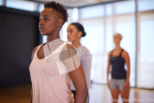 Image of Dancer, African woman and training in studio with vision for choreography, moving and exercise for art. Girl, person and dancing in class for ballet, performance and workout with idea for creativity