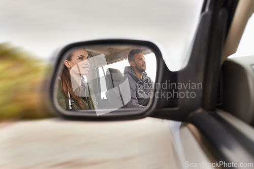 Image of Couple, car and mirror on roadtrip with travel for adventure, vacation and reflection with happiness in countryside. Woman, man and driving in transport for holiday journey, tourism or honeymoon trip