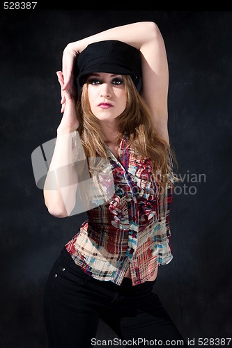 Image of Cute girl with arms around head