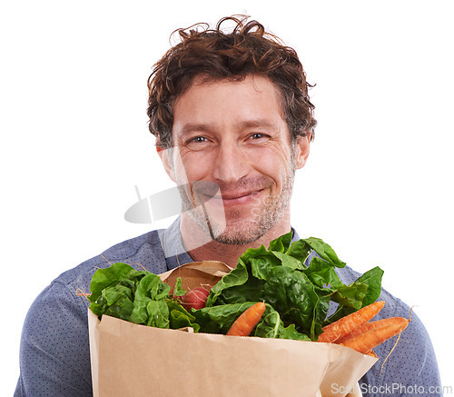 Image of Studio, happy and portrait of man with groceries on promotion, sale or discounts deal on nutrition. Smile, delivery offer and male person with healthy food for cooking, organic fruits or diet choice