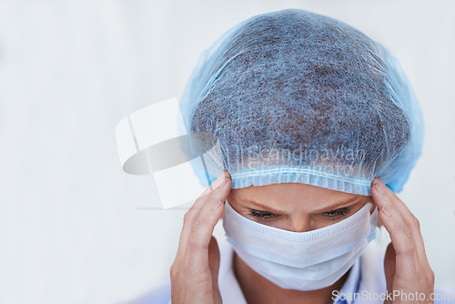 Image of Face mask, doctor and stress from surgery risk and safety gear for healthcare and medical job. Hospital, ppe and person in clinic with working and health protocol in facility with anxiety and burnout