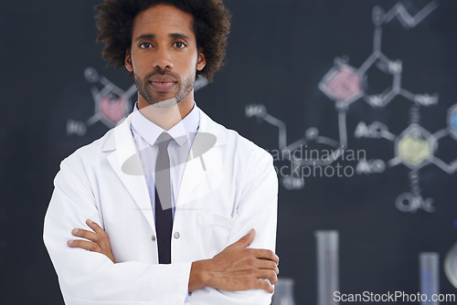 Image of Scientist, portrait and arms crossed with confidence in laboratory for chemical research, medical study and serious. Science, african professional and face with pride for pharmaceutical experiment
