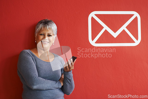 Image of Portrait, woman and cellphone with message in mockup, notification and text on smartphone for networking. Elderly person, smile and happy with mobile for communication, connectivity with technology