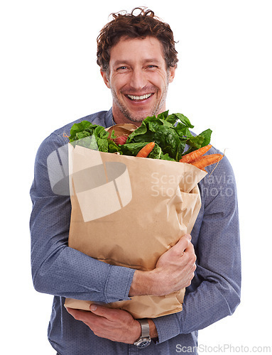 Image of Studio, smile or portrait of man with groceries on promotion, sale or discounts deal for nutrition. Happy, delivery offer and male person with healthy food for cooking, organic fruits or diet choice