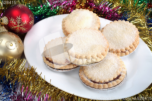 Image of Mince pies and christmas decorations