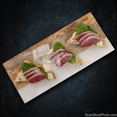 Image of Bruschetta with slice of duck breast