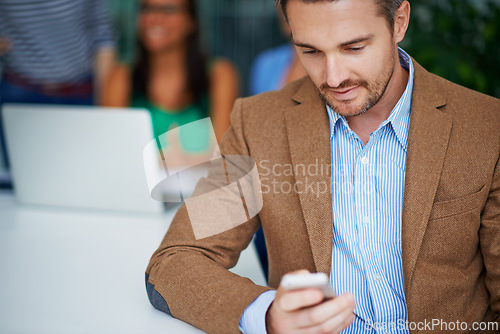 Image of Office, business and man checking phone for networking, email or scroll on social media. Communication, tech startup and businessman on smartphone for consulting, connection or online chat in meeting