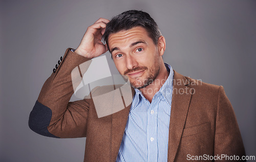 Image of Businessman, portrait and head scratch for confusion in studio, uncertain and gray background. Male person, question and doubt in planning for choice or decision, mockup space and problem solving