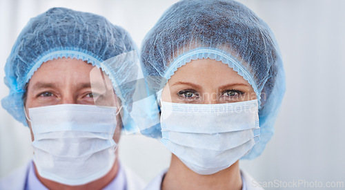 Image of Face mask, doctor and portrait with surgery and safety gear for healthcare and wellness job. Hospital, ppe and people in clinic with working and health protocol in facility with care and staff